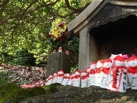 Japanese Shrine with Red Dolls
