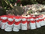 Close up of Red Dolls at Japanese Shrine